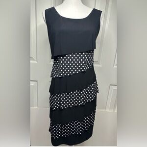 Cato Black Midi Dress featuring asymmetrical black and white polka dot ruffle